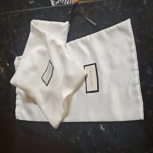 Gucci Two Dust Bags.